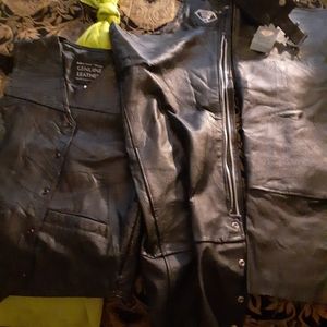 Black leather motorcycle vest and chaps